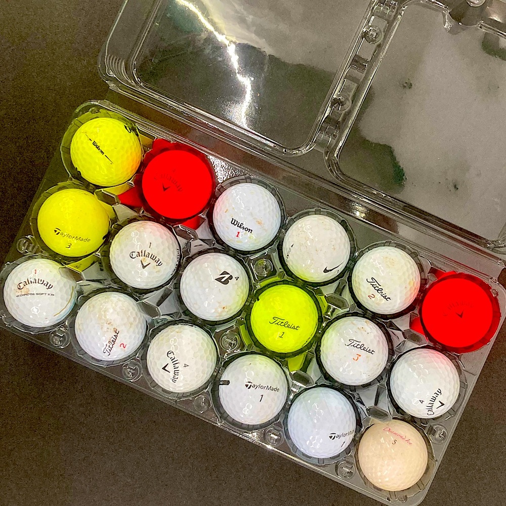 Assortment of 18 used name brand golf balls